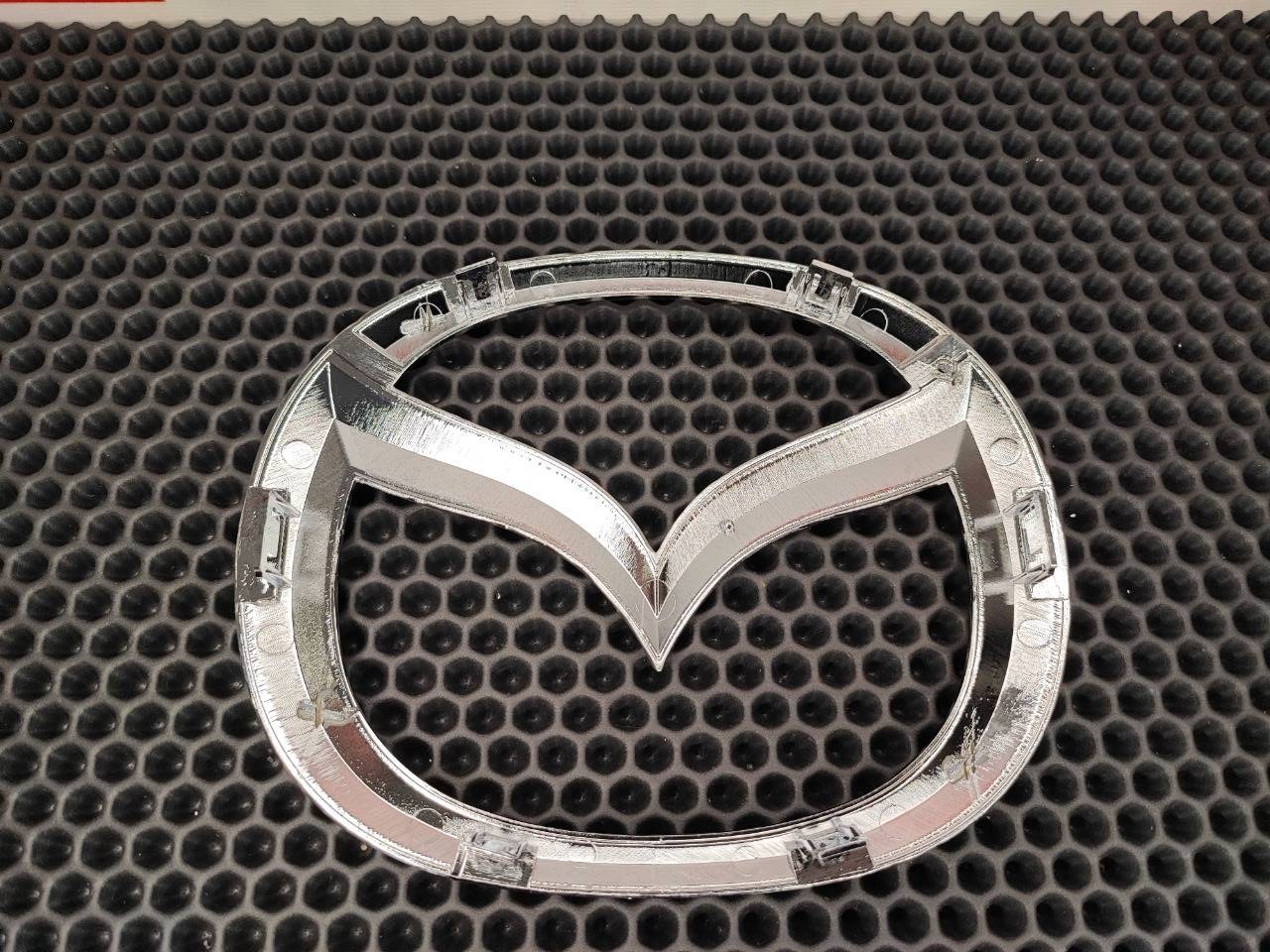 Эмблема решетки радиатора Mazda CX-5 KE