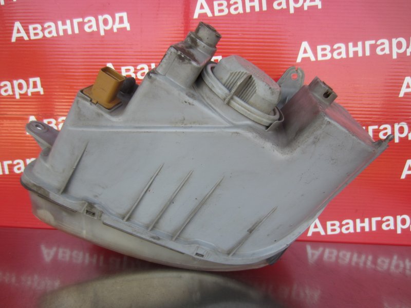 Фара Nubira J150 2001