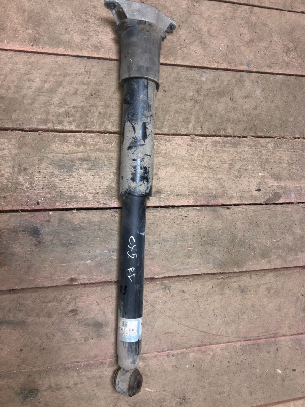 Передняя стойка мазда сх5. Задний амортизатор мазда сх-5. Mazda cx 5 задний амортизатор. Kfy928910b амортизатор mazda cx5. Задний амортизатор mazda cx 5.