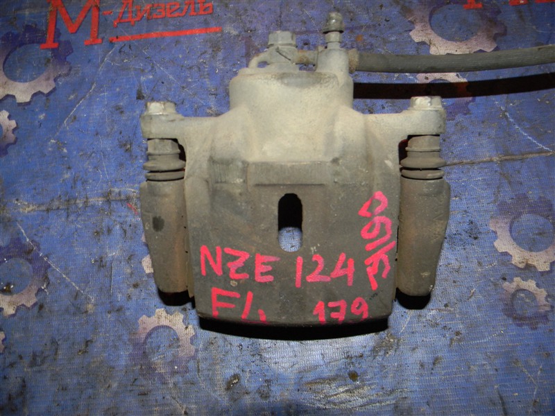 Суппорт передний левый COROLLA FIELDER 2005 NZE124 1NZ-FE