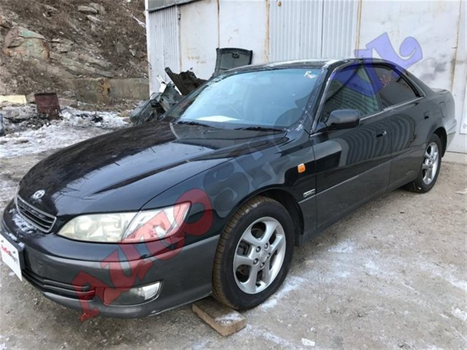 Замок лючка бензобака WINDOM 2000г.; MCV21 2MZFE