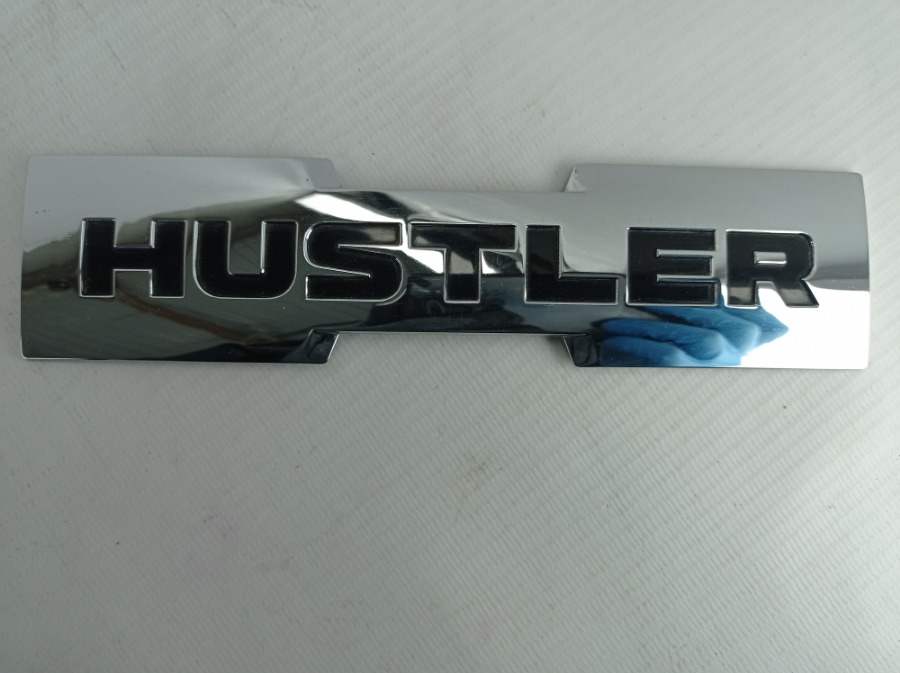 Эмблема задняя Suzuki Hustler 2014-2019 MR31S 77831-65 p0 контрактная
