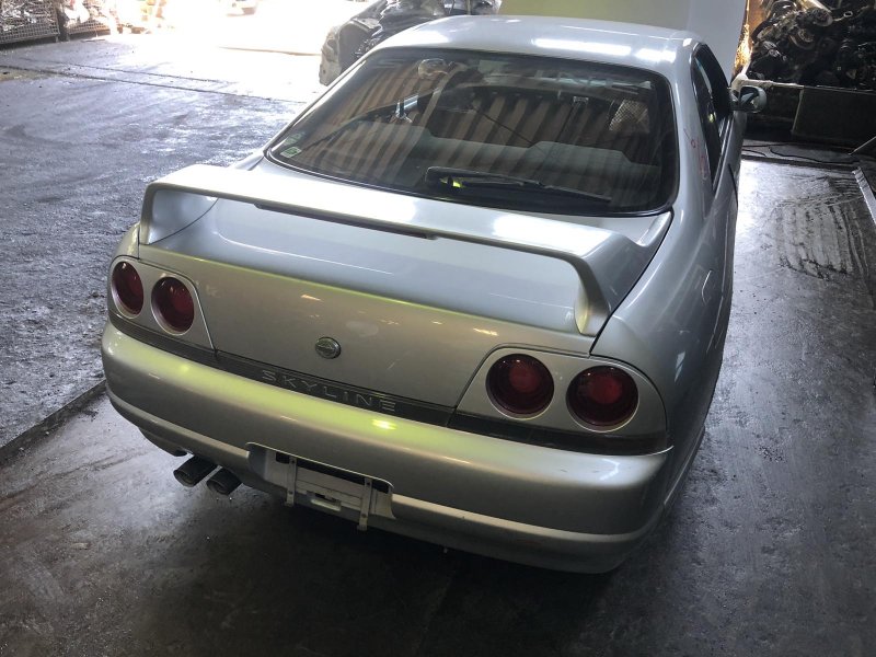 Бампер задний SKYLINE 1995 ENR33 RB25DE