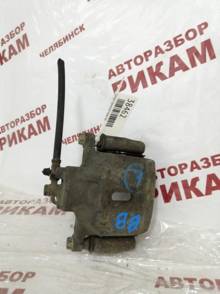 Суппорт тормозной передний левый TOYOTA BB NCP35 4775052020 контрактная