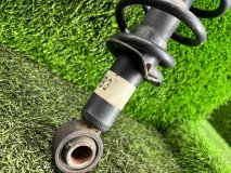 Стойка подвески 89 т. км левая задняя Toyota Corolla Fielder NZE141 2007 1NZFE