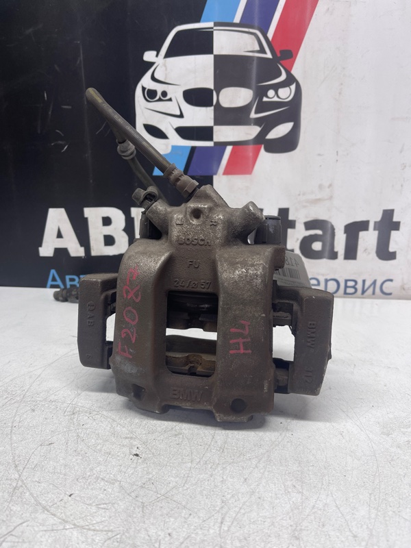 Суппорт тормозной BMW 116i F20 N13B16A 2013г. Июнь перед. лев. (б/у)