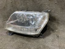 Фара ксеноновая левая Suzuki Escudo TA74V