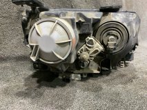 Фара ксеноновая левая Suzuki Escudo TA74V