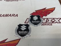 Эмблема Suzuki