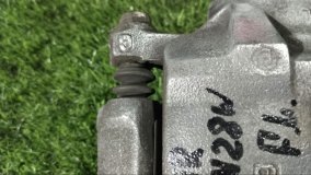 Суппорт тормозной левый передний Mitsubishi RVR N28W