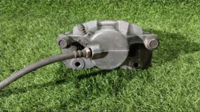 Суппорт тормозной левый передний Mitsubishi RVR N28W