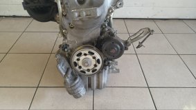 Двигатель Toyota Passo KGC30 2010 1KRFE