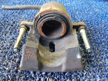 Суппорт левый передний TOYOTA SIENTA NCP85