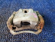 Суппорт левый передний TOYOTA BB NCP35