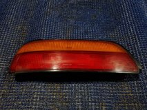 Стоп-сигнал левый задний NISSAN PRESEA PR10