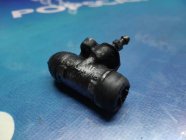 Рабочий тормозной цилиндр левый задний Toyota Vitz SCP10 2000 1SZ-FE