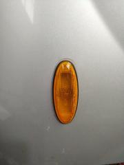 Запчасть поворотник в крыле Mazda Premacy 2004