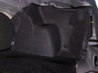 Обшивка багажника правая Mazda Axela