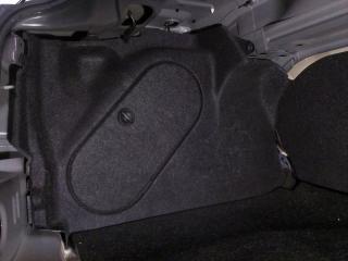 Обшивка багажника левая Mazda Axela