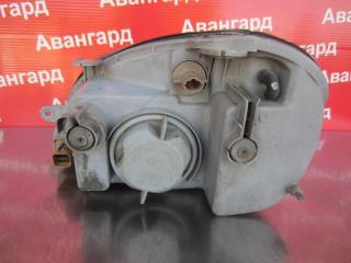 Фара Nubira J150 2001