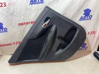 Запчасть обшивка двери задняя левая Toyota Corolla