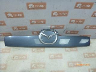 Накладка крышки багажника задняя Mazda CX-7 2012