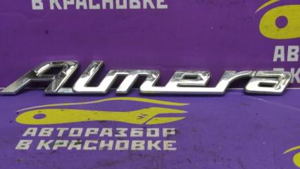 Эмблема крышки багажника Nissan Almera 2001
