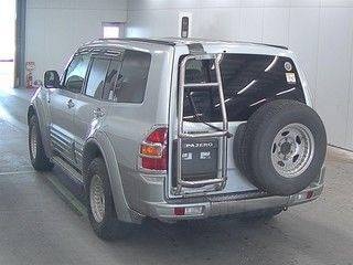 Клык бампера правый Pajero V73W 6G74