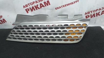 Решетка радиатора левая NISSAN MARCH 2004