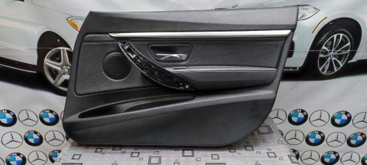Обшивка двери передняя правая BMW