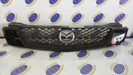 Решетка радиатора Mazda Demio 2001