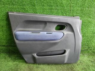 Запчасть обшивка двери передняя левая SUZUKI Chevrolet Cruze 2003